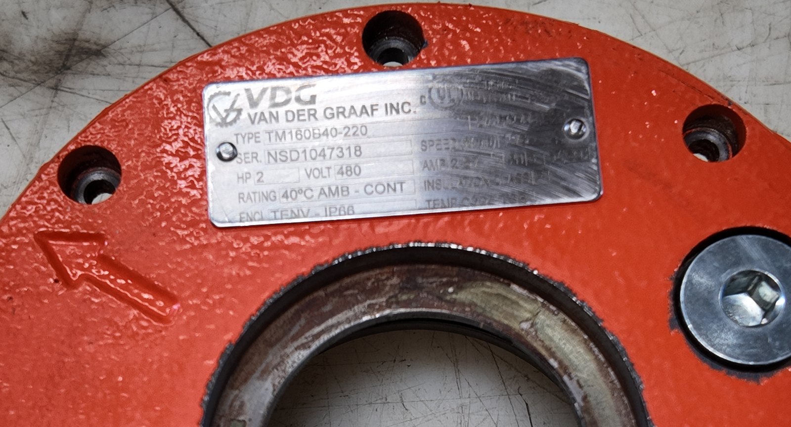 Van der Graaf nameplate on a drum motor end flange reading TYPE TM160B40-220